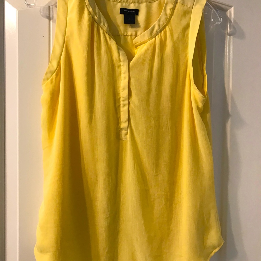 Yellow sleeveless blouse